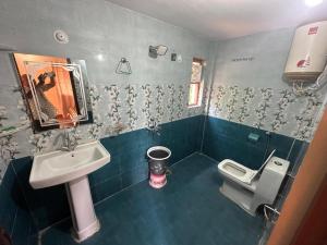 Ένα μπάνιο στο Ekantha Homestays & Resorts