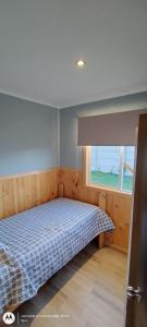 Postel nebo postele na pokoji v ubytování Cabaña Puyehue