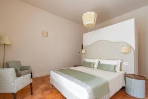 Postel nebo postele na pokoji v ubytování Aqua Mirabilis Relais de Charme