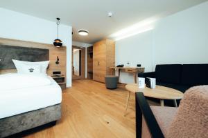 Rúm í herbergi á Hotel Tradizio