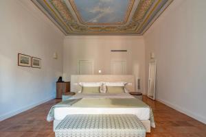 Postel nebo postele na pokoji v ubytování Aqua Mirabilis Relais de Charme