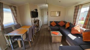 Χώρος καθιστικού στο KP Holiday Home