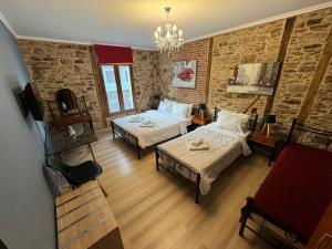 A television and/or entertainment centre at Ionia rooms