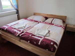 Postel nebo postele na pokoji v ubytování Guest House Krpole