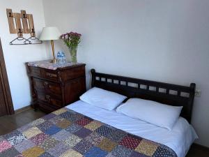 Säng eller sängar i ett rum på Tbilisi Tales