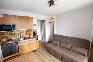 Kuchyňa alebo kuchynka v ubytovaní Studio 24m2, 1 chambre pied des pistes