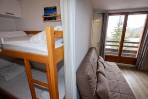 Posteľ alebo postele v izbe v ubytovaní Studio 24m2, 1 chambre pied des pistes