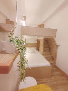 Postel nebo postele na pokoji v ubytování VG Pension and Residences