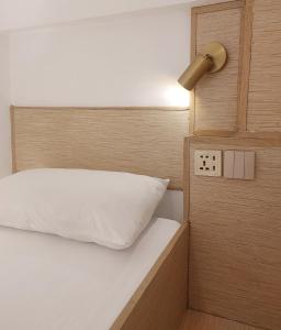 Postel nebo postele na pokoji v ubytování VG Pension and Residences