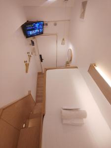 TV a/nebo společenská místnost v ubytování VG Pension and Residences