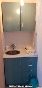 A kitchen or kitchenette at Elisso Villas