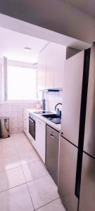 Kuchyň nebo kuchyňský kout v ubytování Apartman T&D