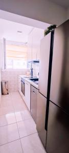 Kuchyň nebo kuchyňský kout v ubytování Apartman T&D