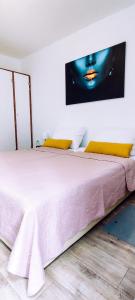 Postel nebo postele na pokoji v ubytování Apartman T&D