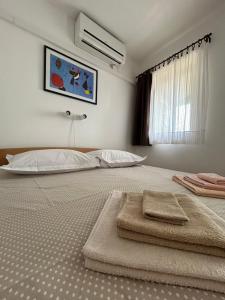 Voodi või voodid majutusasutuse Guesthouse Fjaka toas