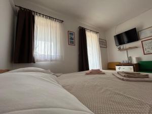 Voodi või voodid majutusasutuse Guesthouse Fjaka toas