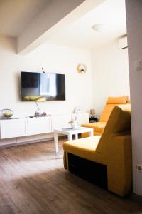 TV a/nebo společenská místnost v ubytování Apartman T&D