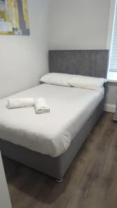 Ένα ή περισσότερα κρεβάτια σε δωμάτιο στο Alexander Apartments Heaton