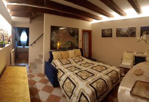 מיטה או מיטות בחדר ב-Ca' Spendore del Sole