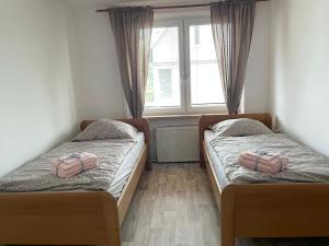 Postel nebo postele na pokoji v ubytování Apartmán Rézi + 13 fotografií
