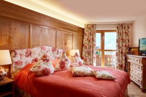 Posteľ alebo postele v izbe v ubytovaní Relais & Châteaux Hotel Tennerhof