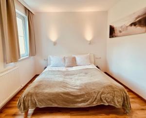 Posteľ alebo postele v izbe v ubytovaní Landhaus Sonnrain Fendels
