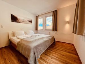 Posteľ alebo postele v izbe v ubytovaní Landhaus Sonnrain Fendels