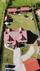 an overhead view of a house with red roofs at Przytulisko na Mazurach in Ruciane-Nida