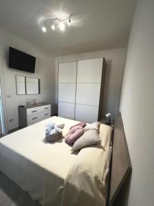 Ένα ή περισσότερα κρεβάτια σε δωμάτιο στο Villa Rita