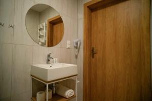 Ein Badezimmer in der Unterkunft Pensjonat GÓRAL