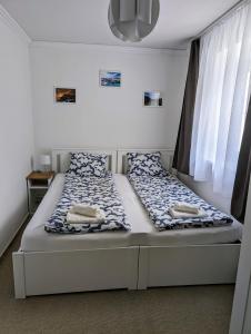 Postel nebo postele na pokoji v ubytování Haus im Hochtal