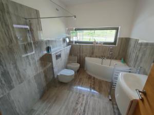 Et badeværelse på Villa Almond