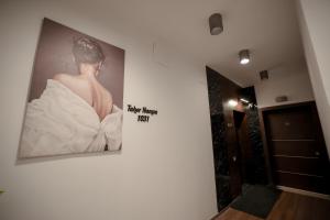 a picture of a woman in a wedding dress on a wall at The Palm Terrace Penthouse 3BR - Palm Hills - 280 sqm in Cairo