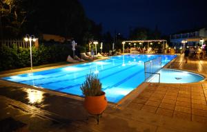 The swimming pool at or close to Dominoes Corfu