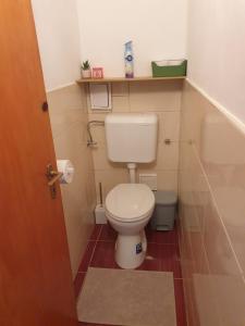 A bathroom at Simay Apartman Még 21 kép