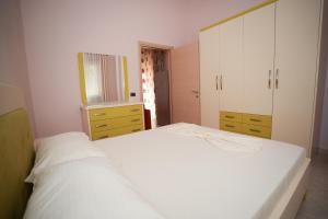 Postel nebo postele na pokoji v ubytování Marika Apart Hotel