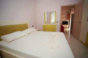 Postel nebo postele na pokoji v ubytování Marika Apart Hotel