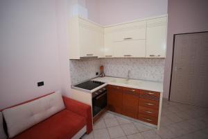 Kuchyň nebo kuchyňský kout v ubytování Marika Apart Hotel