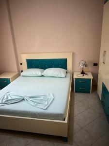 Postel nebo postele na pokoji v ubytování Marika Apart Hotel