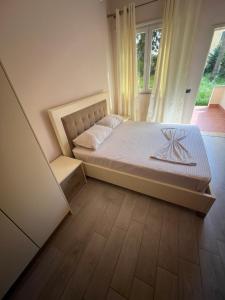 Postel nebo postele na pokoji v ubytování Marika Apart Hotel
