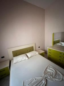 Postel nebo postele na pokoji v ubytování Marika Apart Hotel
