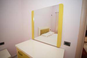 Postel nebo postele na pokoji v ubytování Marika Apart Hotel