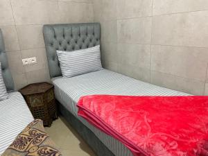 Ένα ή περισσότερα κρεβάτια σε δωμάτιο στο Chez layla