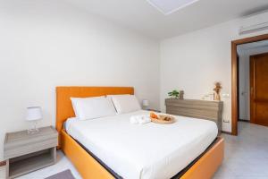 Postel nebo postele na pokoji v ubytování [Tirso Home] Casa in centro Free parking & Wifi