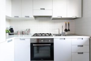 Kuchyň nebo kuchyňský kout v ubytování [Tirso Home] Casa in centro Free parking & Wifi + 17 fotografií