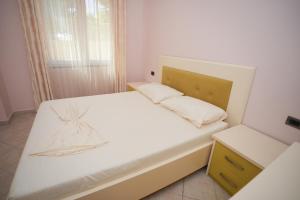 Postel nebo postele na pokoji v ubytování Marika Apart Hotel