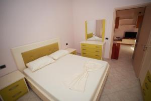 Postel nebo postele na pokoji v ubytování Marika Apart Hotel