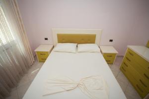 Postel nebo postele na pokoji v ubytování Marika Apart Hotel