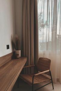 A seating area at Theros Luxury Apartment