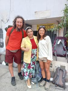 a group of three people posing for a picture at CHAVIN inn with kitchen compartida Lima in Lima